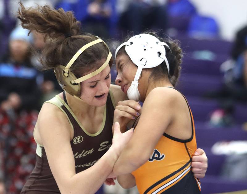 Jacobs’ Julia Felton, left, battles McHenry’s Alexa Colin-Garcia at 110 pounds in varsity girls IHSA Regional Championship wrestling action on Saturday, February 7, 2026, at Hampshire High School in Hampshire.