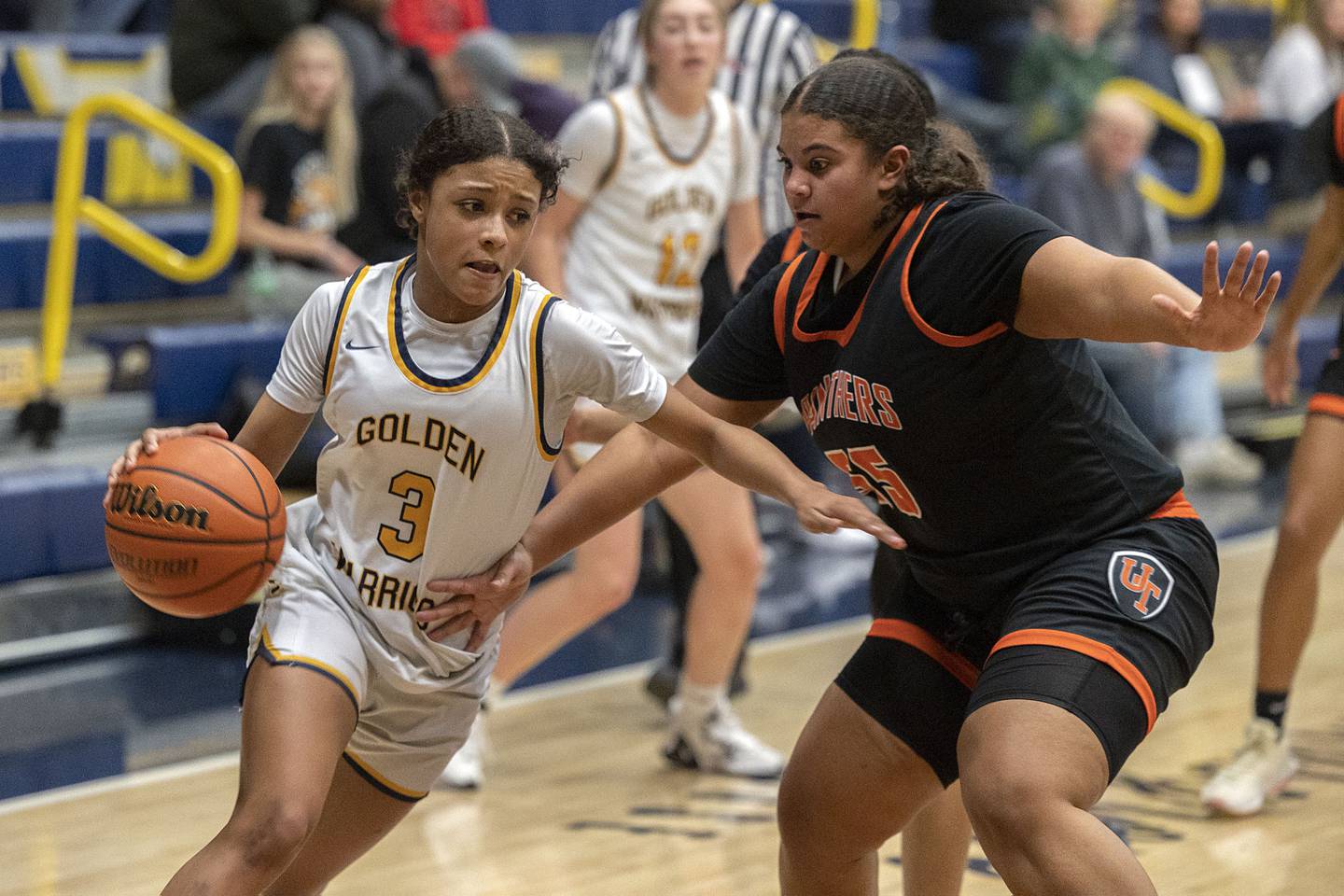 Sterling’s Delali Amankwa drives against United Township’s Shawntia Lewis Thursday, Jan. 19, 2023.