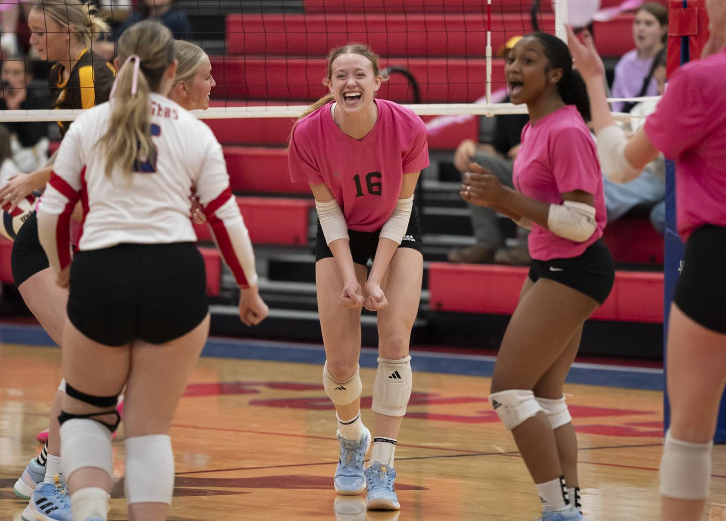 Dundee-Crown's Victoria Brents, center, celebrates a point with teammates during their game against Jacobs on Thursday, October 16, 2025 at Dundee-Crown High School in Carpentersville. Ryan Rayburn for Shaw Local