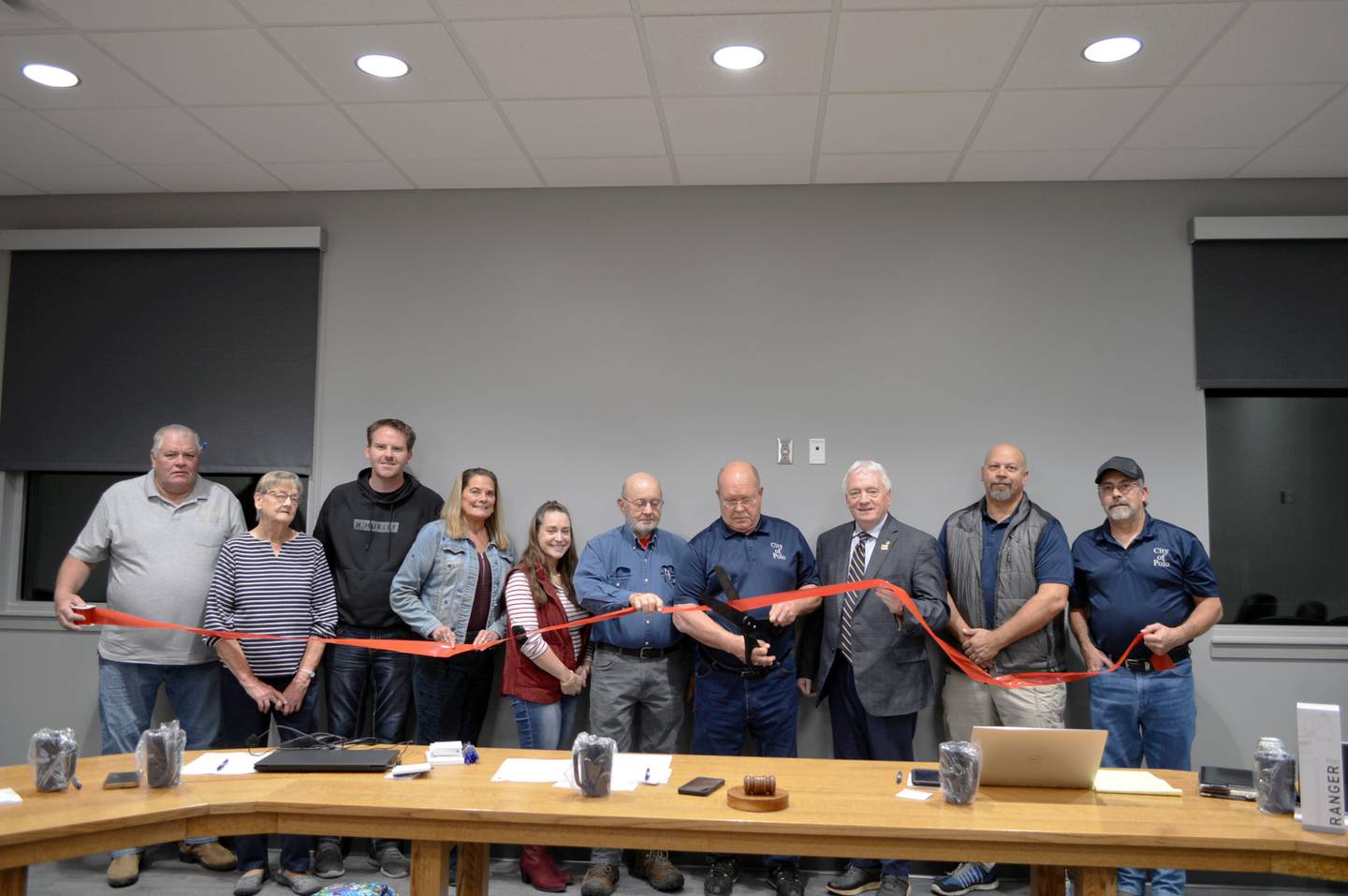 A ribbon-cutting was held Monday, Nov. 4, 2024, for the new Polo City/Buffalo Township Hall, located at 118 N. Franklin Ave., Polo. Left to right are Alderperson Randy Schoon, Buffalo Township Clerk Judith Norris, Alderperson Joey Kochsmeier, city Treasurer Tammy Merdian, City Clerk Sydney Bartelt, Buffalo Township Supervisor Phil Fossler, Polo Mayor Doug Knapp, city attorney M. Thomas Suits, and Alderpersons Keith Chesnut and Larry Weaver.