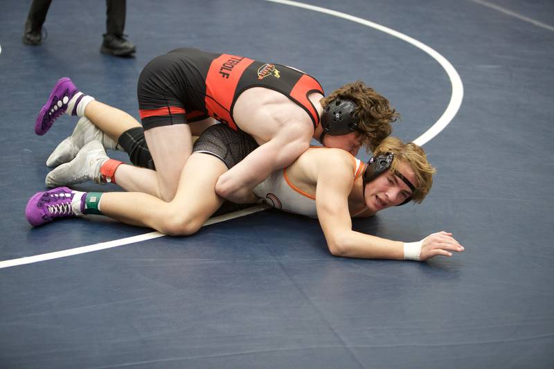 Batavia's Kaden Fetterolf and St. Charles East's Gavin Connelly compete in the 152 lb. Finals at the DuKane Wrestling Conference meet at Lake Park High School on Saturday, Jan.21,2023 in Roselle.