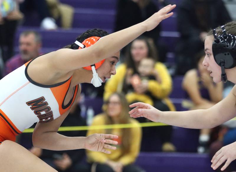 McHenry’s Natalie Corona, left, battles Barrington’s Nicole Dziura at 140 pounds in IHSA Regional wrestling semifinal action on Saturday, Feb. 1, 2025, at  Hampshire High School  in Hampshire.
