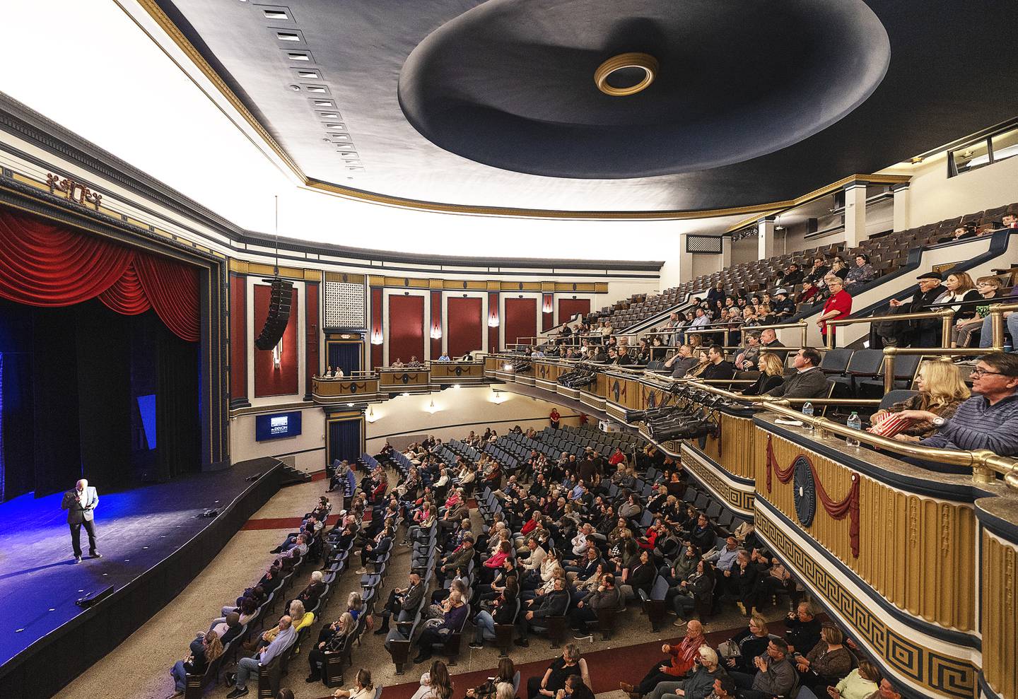 Mike Venier, President of the Dixon Theatre board, welcomes guests Sunday, March 2, 2025, to the reopening of The Dixon after a lengthy renovation. New paint, plaster, roof, restrooms and brick work were all part of the rehab.