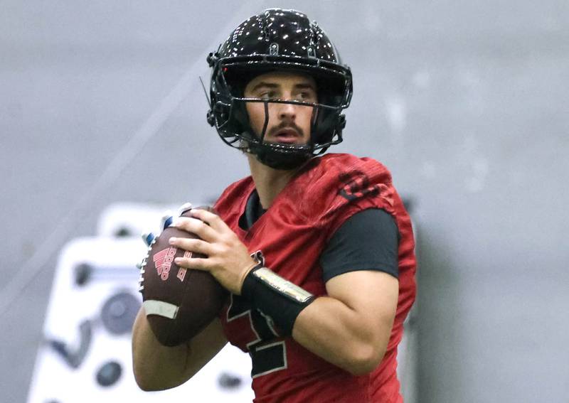 Northern Illinois University quarterback Ethan Hampton looks for a receiver Wednesday, July 31, 2024, during practice in the Chessick Practice Center at NIU.