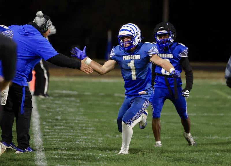 Princeton's Casey Etheridge celebrates during the Tigers' 48-0 win over Erie-Prophetstown on Friday, Oct. 24, 2025 at Bryant Field in Princeton.