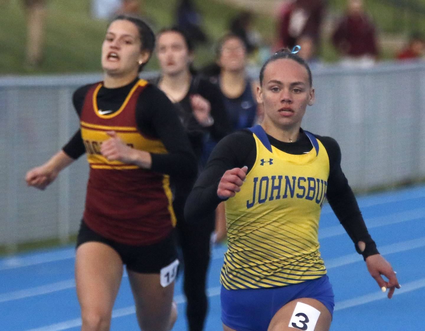 Johnsburg’s Hope Klosowicz wins the 400 meter run during the Kishwaukee River Conference Girls Track and Field Meet on Tuesday, May 5, 2025, at Woodstock High School.