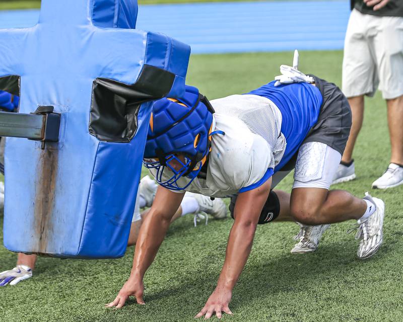 Brady Rusk does some sled work at Lyons football practice, Monday, Aug 18, 2025  in Western Springs.