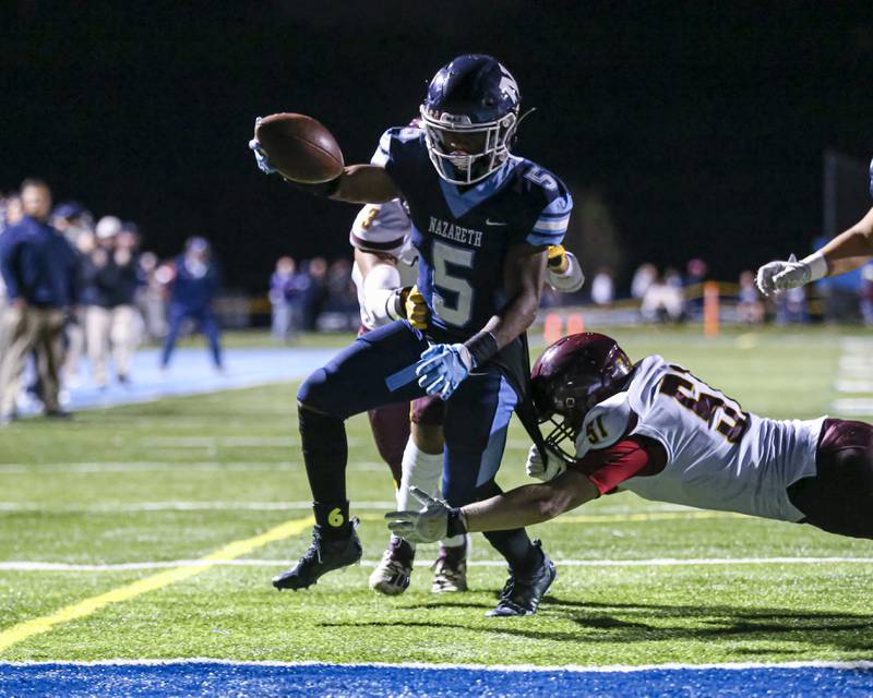 Nazareth Academy's Kaleb Miller (5) scores a touchdown during football game between Montini at Nazareth Academy Oct 15, 2021.