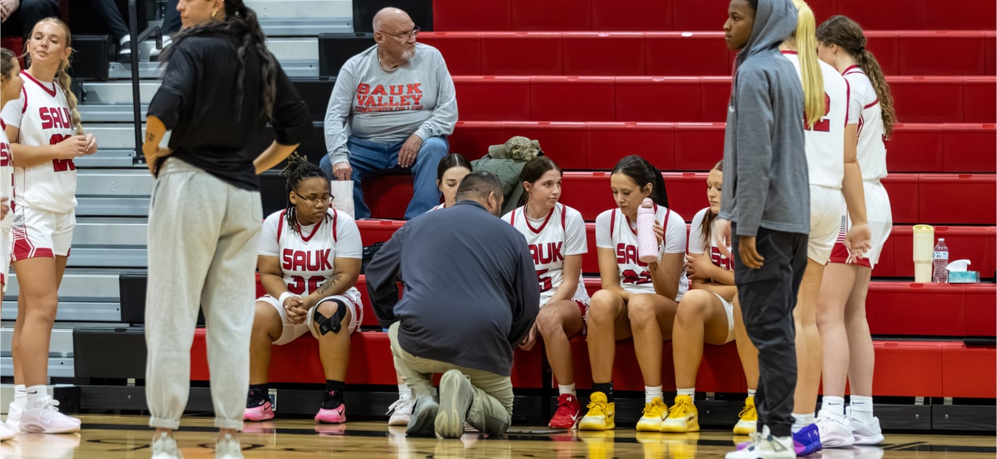 Jim Nugent works the Sauk Valley huddle during a timeout this past season. After having their 2024-25 season cancelled after just six games, Nugent led the Skyhawks to an 11-19 record.