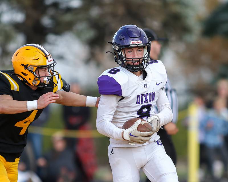 Dixon's Daniel Fordham (8) runs after a catch during Class 4A second round playoff football playoff game between Dixon at St Laurence.  Nov 4, 2023.