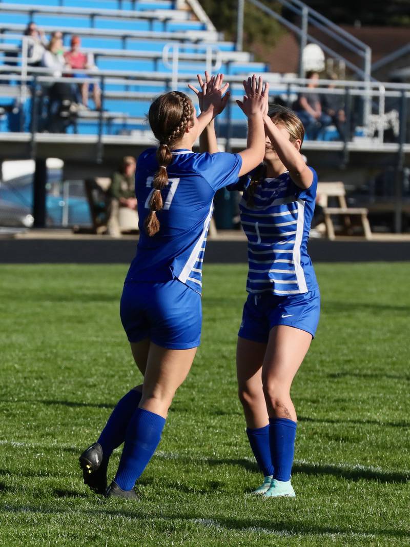 Princeton's Ava Kyle (left) and Olivia Sandoval celebrate a goal Monday at Bryant Field.