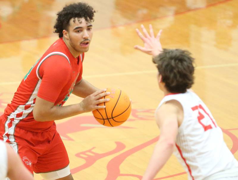 L-P's Marion Persich looks to pass the ball around Streator's Brennen Stillwell on Tuesday, Jan. 13, 2026 in Pops Dale Gymnasium at Streator High School.