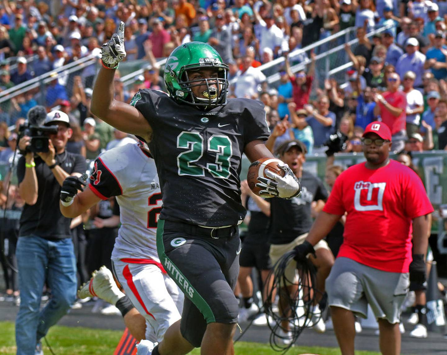 Glenbard West running back Jalen Moore scores a touchdown during a game against visiting Maine South on Saturday, Aug. 31 2019.