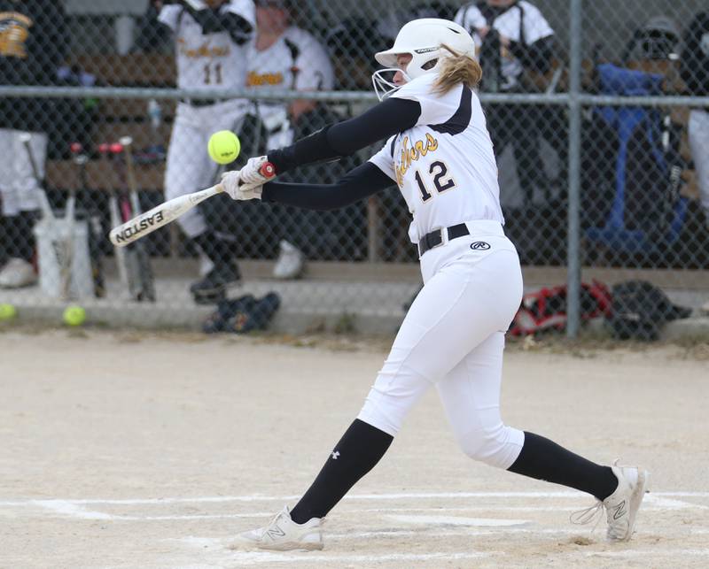 Putnam County's Tori Bilma gets a hit against Flanagan-Cornell/Woodland on Tuesday, May 2, 2023 at Woodland High School.