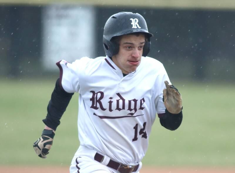 Prairie Ridge’s Ryan Myers cruises home to score against Jacobs in varsity baseball on Wednesday, April 9, 2025, at Prairie Ridge High School in Crystal Lake.