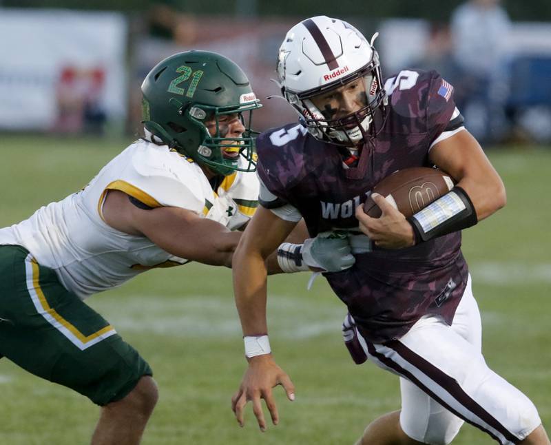 Prairie Ridge's Joseph Vanderwell runs away from during a Fox Valley Conference football game Friday, Sept. 1, 2023, at Prairie Ridge High School inCrystal Lake.