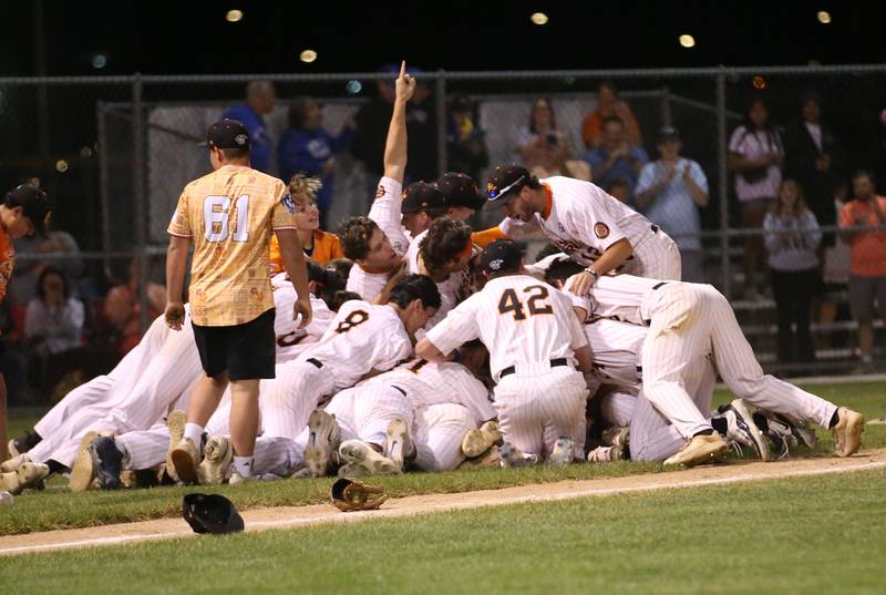 Members of the Illinois Valley Pistol Shrimp baseball team celebrate after winning the Prospect League Championship against Rex on Wednesday, Aug. 7, 2024 at Schweickert Stadium in Peru.