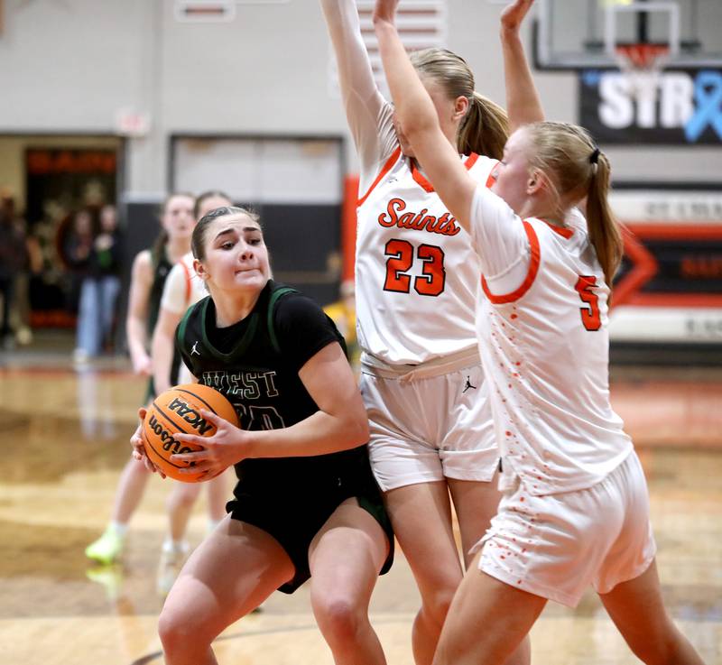 Glenbard West's Ellie Noble looks for an opening during a Class 4A St. Charles East Sectional semifinal against St. Charles East on Tuesday, Feb. 25, 2025 in St. Charles.
