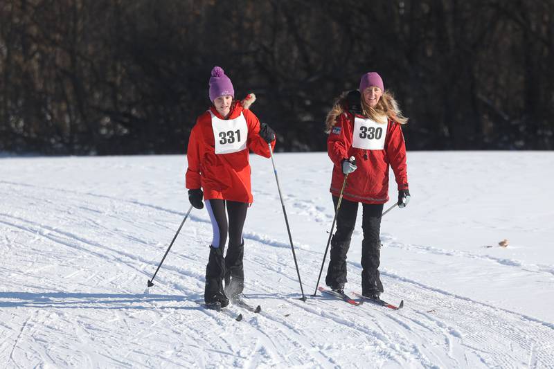 Family members stay together in the Joliet Nordic Ski Club 4k and 12k race on Saturday, Jan. 20th, 2024 at Woodruff Golf Course in Joliet.