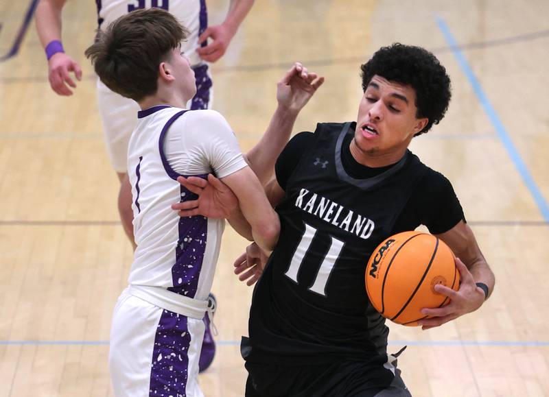 Kaneland's Evan Frieders runs into Rochelle's Cohen Haedt Tuesday, Feb. 3, 2026, in their game at Rochelle High School.