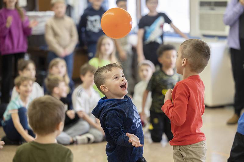 Pre-K kids at St. Anne’s School in Dixon work to keep a balloon afloat Tuesday, Jan. 28, 2025, at the school. In celebration of Catholic Schools Week, students are being treated to a week of fun and service.