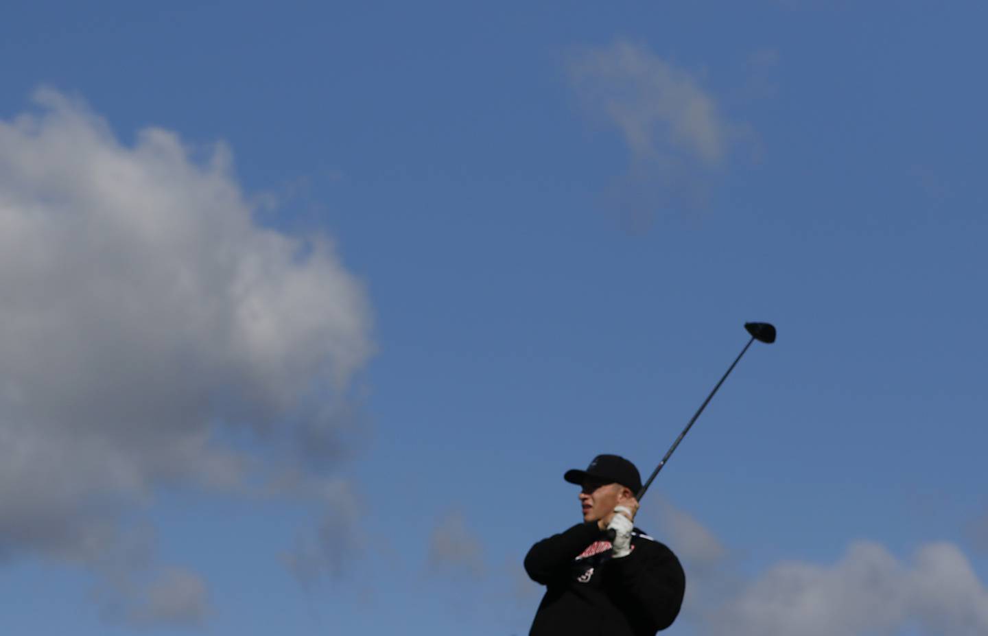 Huntley’s Brendan Busky watches his tee shot on the fifth hole during the Fox Valley Conference Boys Golf Tournament. Thursday, Sept. 22, 2022, at Randall Oaks Golf Club in West Dundee.