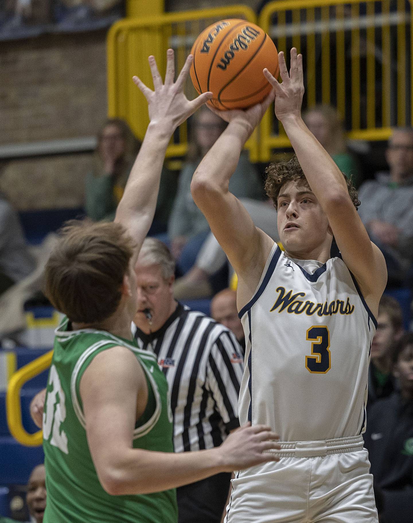 Sterling’s Brady Berlin puts up a shot over Geneseo’s Landon Nordstrom Friday, Dec. 5, 2025.