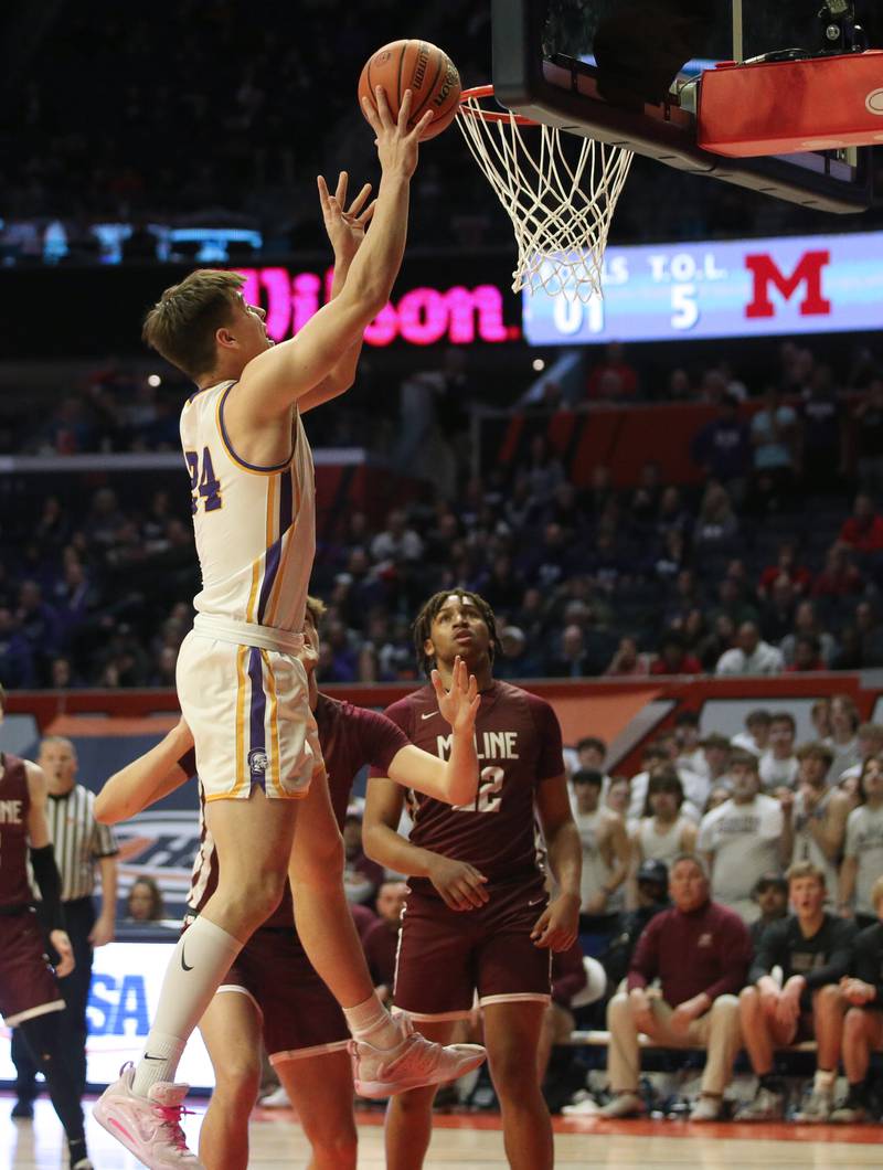 Downers Grove North's Alex Miller pulls up in the lane to score over Moline's Owen Freeman and Treyvon Taylor during the Class 4A state semifinal game on Friday, March 10, 2023 in Champaign.