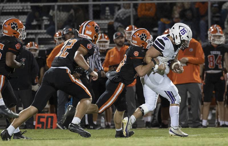 Dixon’s Brady Lawrence picks up yards against Byron Friday, Sept. 5, 2025, at Byron High School.
