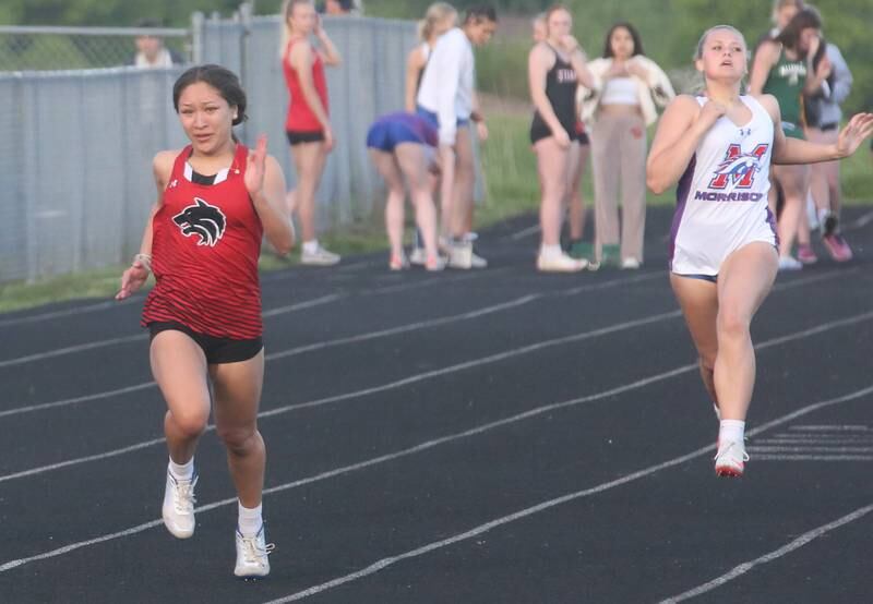 Indian Creek's Sally Diaz and Morrison's Keira Hudson compete in the 100 meter dash during the Class 1A Sectional meet on Wednesday, May 8, 2024 at Bureau Valley High School.