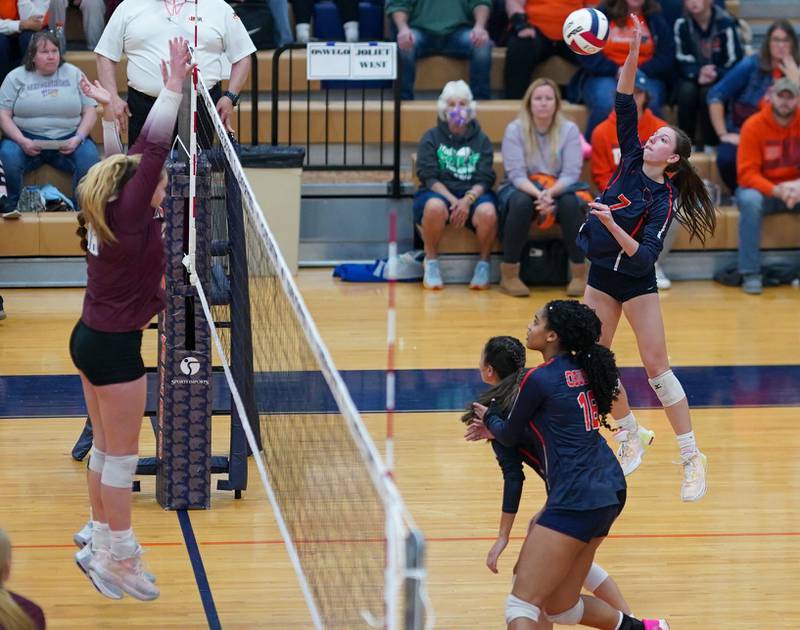 Oswego’s Kelsey Foster (7) goes up for a kill against Lockport during a class 4A Oswego Sectional semifinal match at Oswego High School on Monday, Oct. 30, 2023.