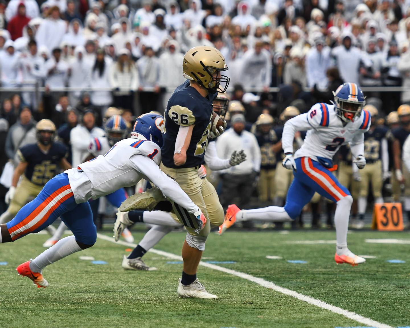 Lemont's Alber Kunickis (26) runs the ball during Class 6A quarterfinal playoff game on Saturday, Nov. 13, 2021, at Lemont High School.