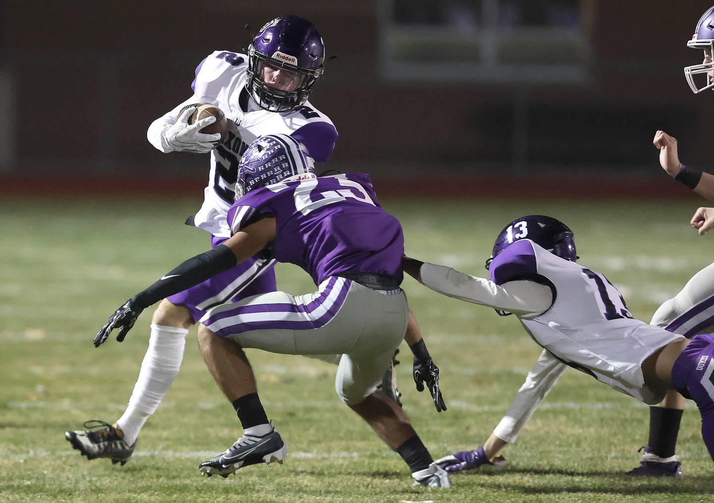Dixon’s Jath St.Pier tries to get by Rochelle’s Aidan Rodriguez during their first round playoff game Friday, Oct. 28, 2022, at Rochelle High School.