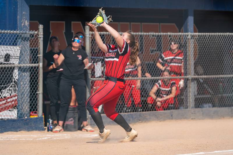 Yorkville's Abby Pool (17) makes an infield catch for an out against Wheaton Warrenville South during the Class 4A Oswego softball sectional final game between Yorkville and Wheaton Warrenville South at Oswego High School on Friday, June 2, 2023.