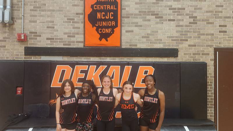 From left, Madyson Rivera, Mariya Alexander, Kara Zimmerman, Eloise Fisher, Amaya Kemp. They were the state champions in the IESA seventh-grade girls 4x100 relay, setting a state record in 52.74 seconds.