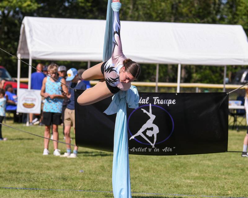 Hannah Ferguson, 14 of Sycamore twirls and twists with Sycamore Performing Arts Academy for a crowd during Cortland Summerfest held at Cortland Community Park on Saturday, Aug. 10, 2024.