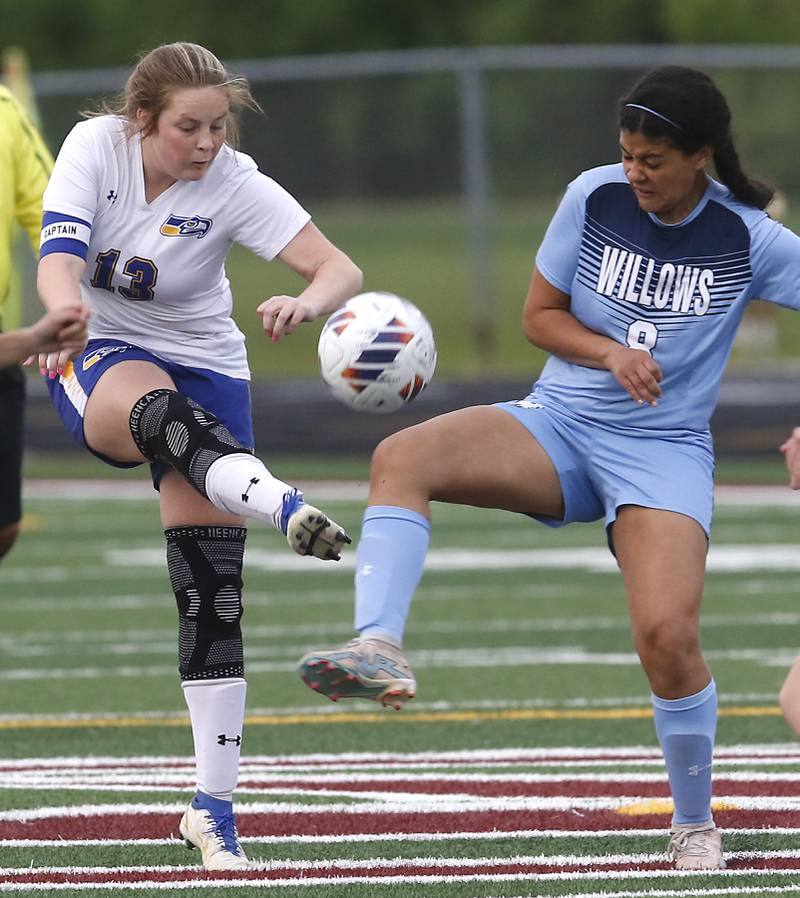 Johnsburg's Mackenzie McOuiston kicks the ball as she is defended by Willows’ Simone Burns during a IHSA Division 1 Richmond-Burton Sectional semifinal soccer match Tuesday, May 16, 2023, at Richmond-Burton High School.