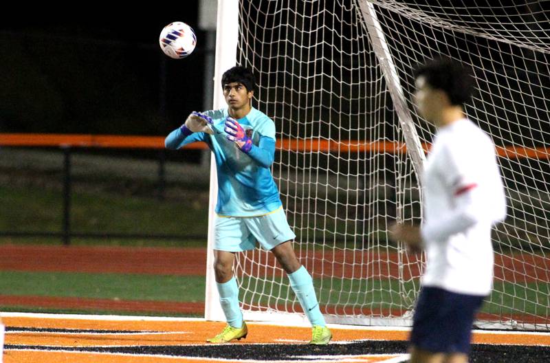 Conant goalkeeper Varun Mittal stops the ball during a 3A St. Charles East Sectional semifinal against Glenbard East on Wednesday, Oct. 26, 2022.