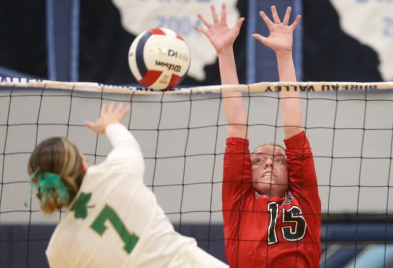 Seneca's Audry McNabb sends a spike to Erie-Prophetstown's Kaylee Keegan in the Class 2A Sectional semifinal game on Tuesday, Nov. 5, 2024 at Bureau Valley High School.