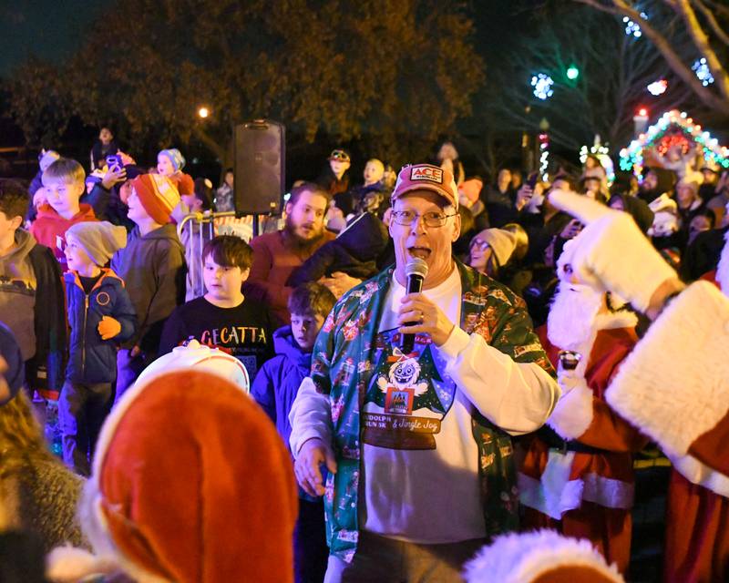 Yorkville’s Mayor John Purcell reacts after the lights were turn on during the tree lighting ceremony on Friday Nov. 21, 2025, held at Riverfront Park in Yorkville.