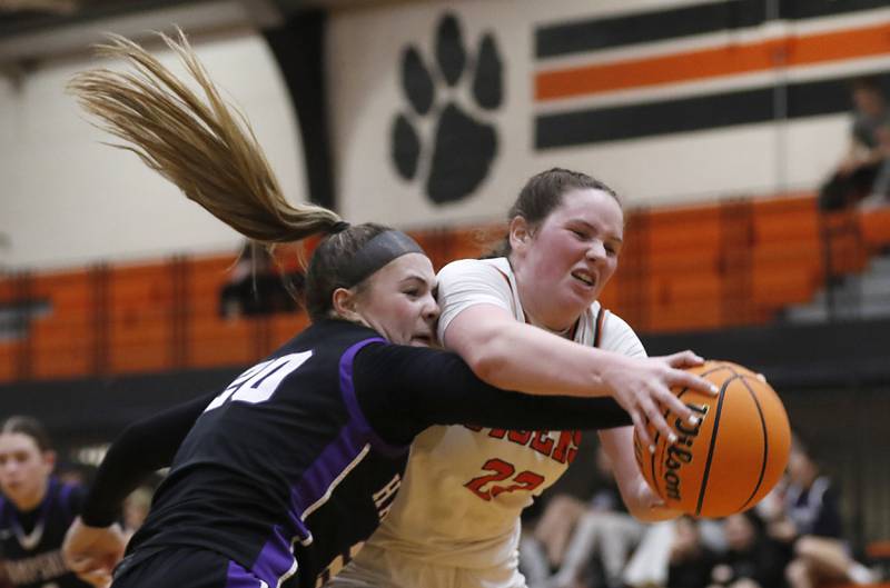 Crystal Lake Central's Leah Spychala is founded by Hampshire's Chloe Van Horn during a Fox Valley Conference basketball game on Friday, Feb. 7, 2025, at Crystal Lake Central High School.