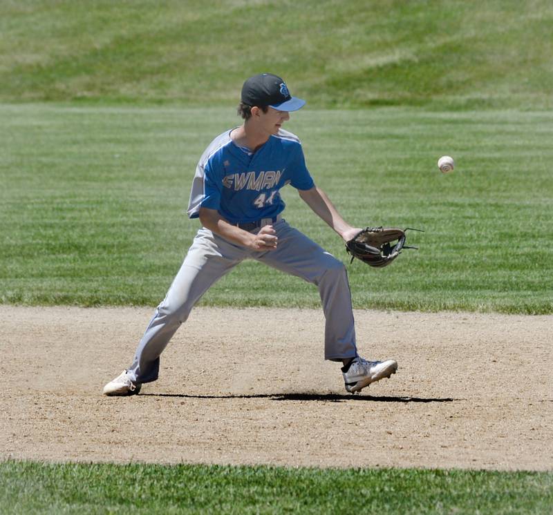 Newman's Kyle Wolfe fields a ground ball at short during the championship game with Dakota at the 1A Pearl City Sectional on Saturday, May 27.