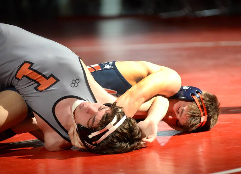 Morrison's Caleb Modglin (bottom) holds his Sandwich opponent in the 144-pound match at a triangular meet with Oregon on Friday, Jan. 31, 2025 in the Blackhawk Center at Oregon High School.