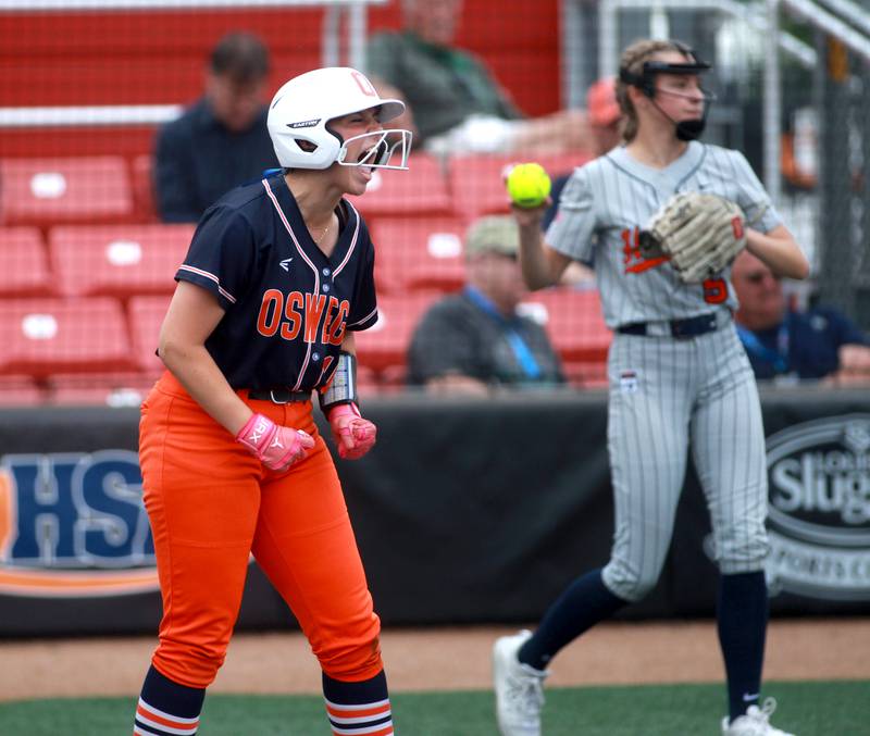 Oswego's Rikka Ludvigson celebrates her run during a IHSA Class 4A state semifinal game against Oak Park-River Forest on Friday, June 13, 2025 at the Louisville Slugger Sports Complex in Peoria.