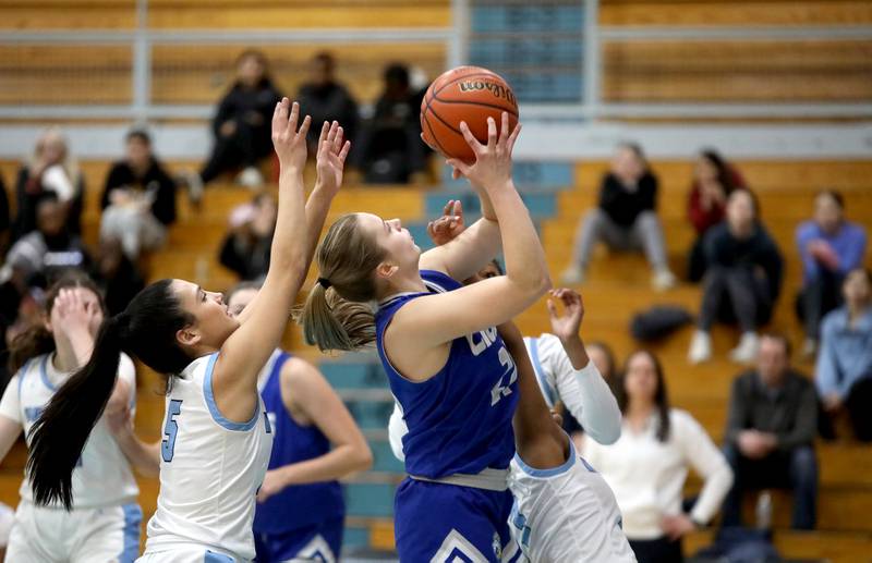 Lyons Township's Gwen Smith shoots the ball during the West Suburban Conference championship game against Downers Grove South on Thursday, Feb. 13, 2025 at Willowbrook High School.