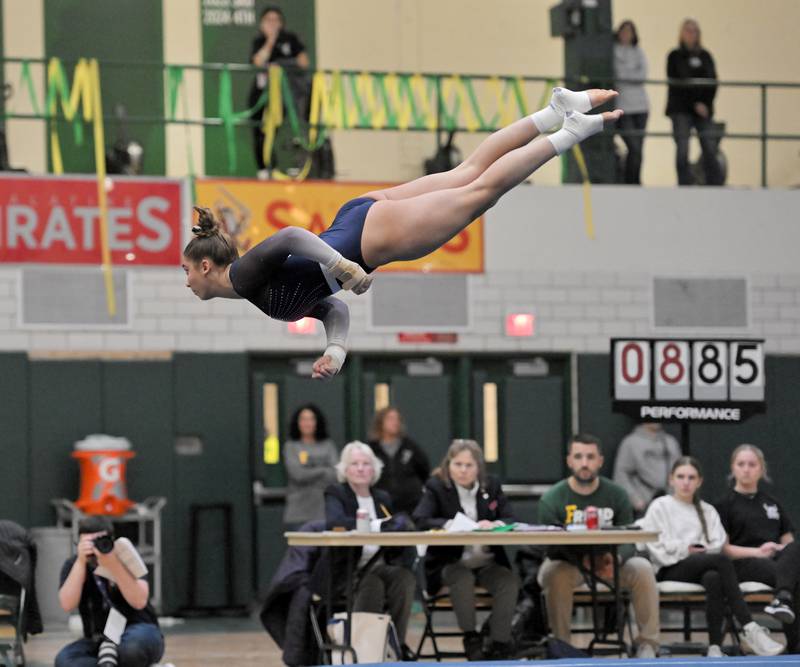 St. Charles Co-op’s Rachel Nicastro performs in the floor exercise at the Fremd girls gymnastics sectional in Palatine on Tuesday, Feb. 11, 2025.