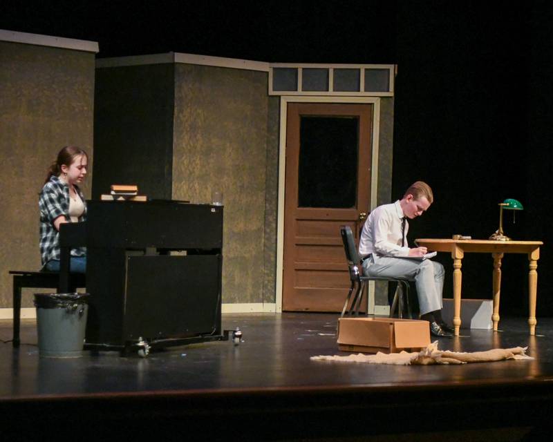 Thomas Kings, right, and Delilah Pawlowski try to write a song during a one act play called Bittersweet Lullaby on Saturday March 22, 2025, held at Lyons Township High School south campus.