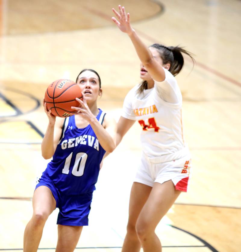 Geneva’s Peri Sweeney attempts a shot past Batavia’s Hallie Crane during the Class 4A Batavia Sectional final on Thursday, Feb. 22, 2024.