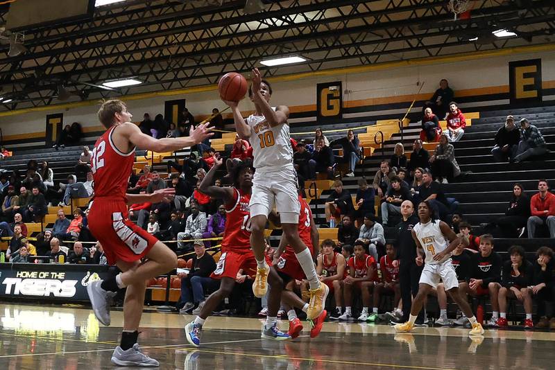 Joliet West’s Zion Gross goes in for a shot against Yorkville on Friday, Jan. 5th, 2024. in Joliet.