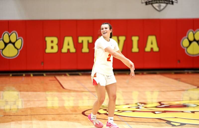 Batavia’s Brooke Carlson celebrates breaking the school’s all-time points scored during a game against St. Charles East at Batavia on Thursday, Feb. 1, 2024.